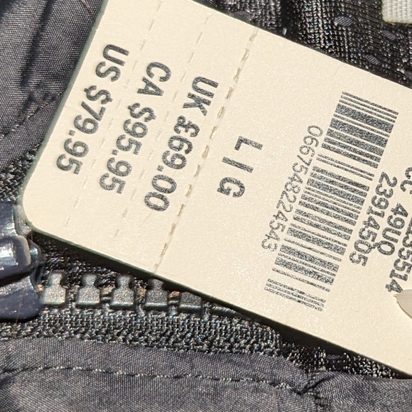 Lightweight nylon oversized jacket with hood. Repels wind and rain - Picture 3 of 3